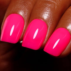 Ozzeal bottle front view showing hot pink neon color and clear labeling for vibrant results