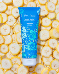 Pacifica bottle placed near tropical decor suggesting uplifting banana scent