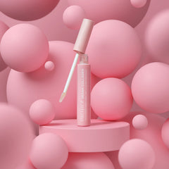 Pacifica model wearing gloss in lifestyle setting demonstrating radiant, fuller-looking lips