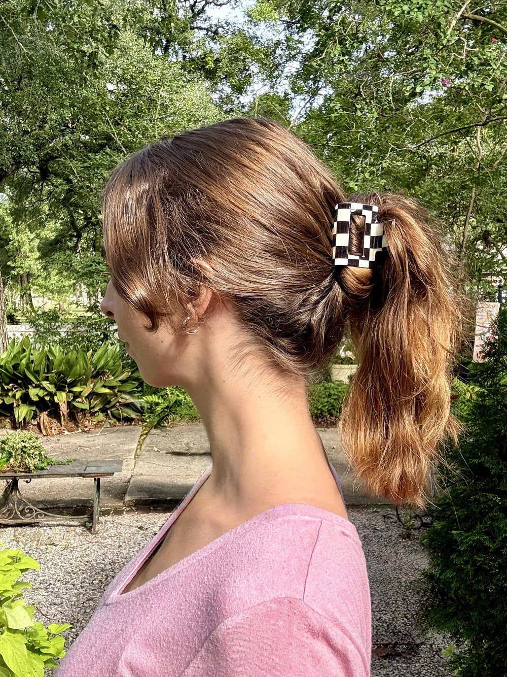 Paderison clip in half-up hairstyle showing secure hold and polished look