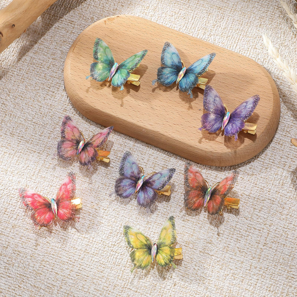 Paderison butterfly clips worn with party outfit for whimsical accent