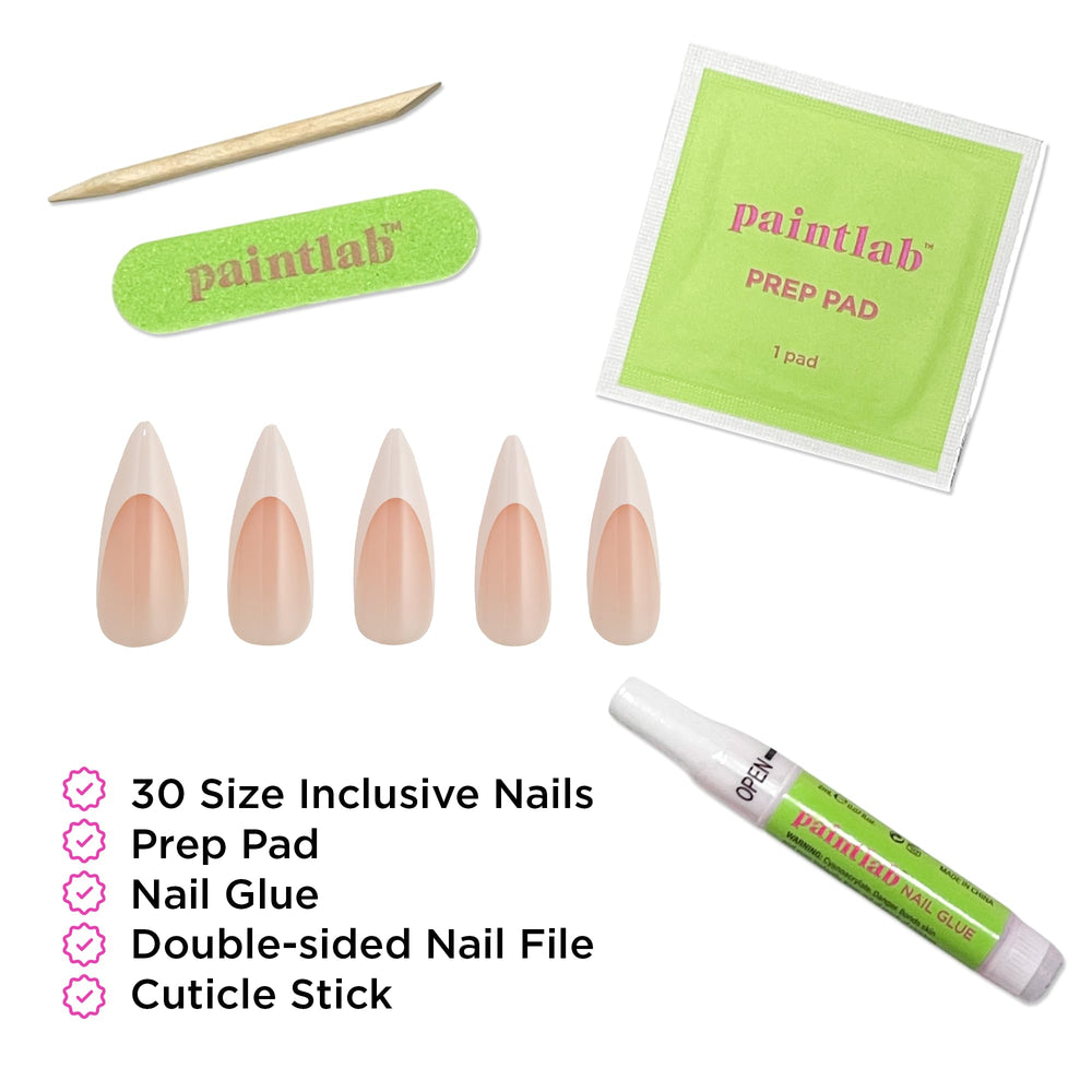 PaintLab full kit laid out with glue, file, and nails for complete at-home manicure convenience