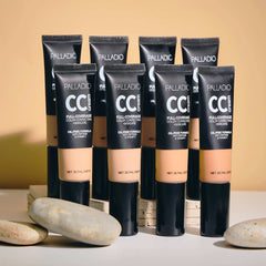 Palladio tube beside a coin for scale to show product size and portability