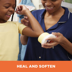 Palmer's applying balm to elbow to visibly soften rough skin