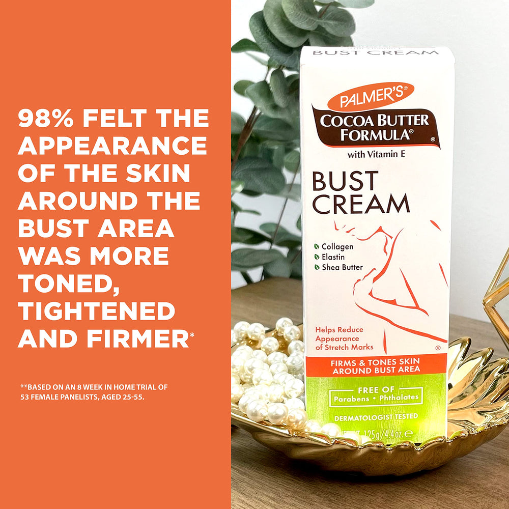 Palmer's cream dispensed on hand ready for massage to improve skin hydration