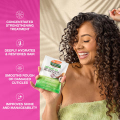 Palmer's being applied to damp hair to show restorative moisture action