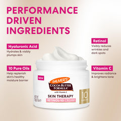 Palmer's ingredient oils arranged with botanicals, emphasizes natural nourishing oils