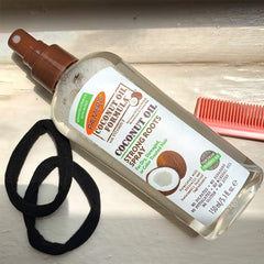 Palmer's spray being applied to scalp for soothing relief