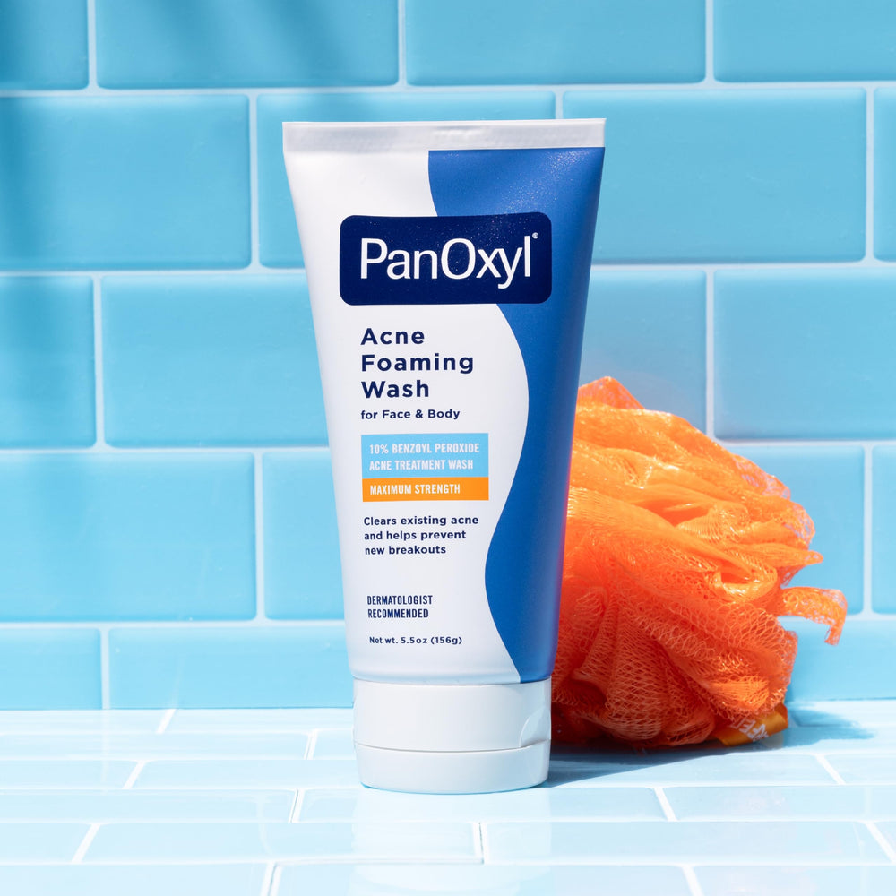 PanOxyl next to everyday items indicating the 5.5 oz size and portability