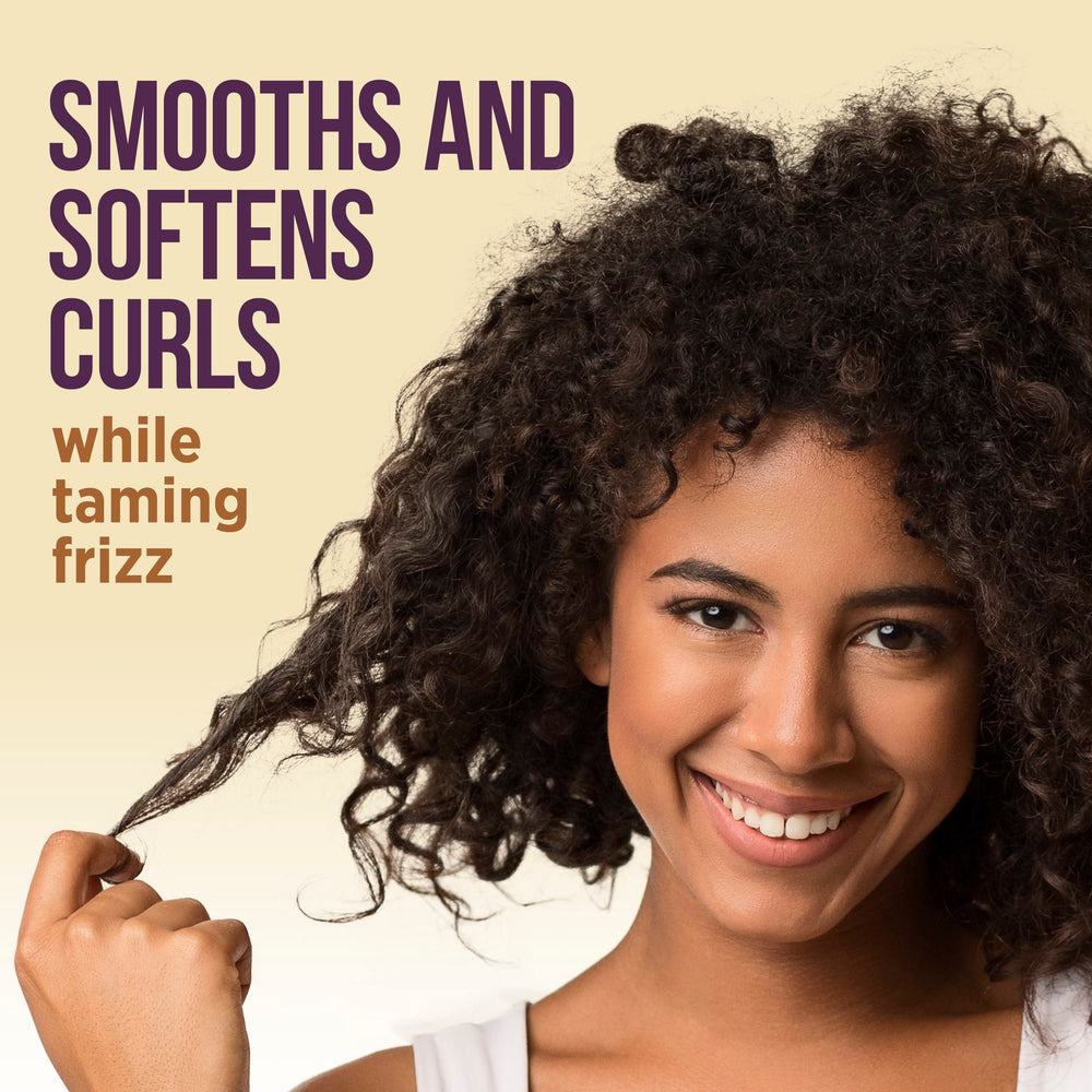 Pantene Gold Series milk texture on hand, demonstrating lightweight argan oil conditioning