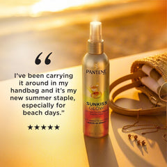 Pantene Sunkiss Glow bottle next to sunscreen for summer protection
