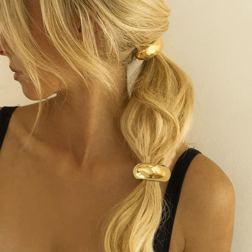 papasgix in-use thick hair ponytail demonstrating secure hold and stylish gold accent