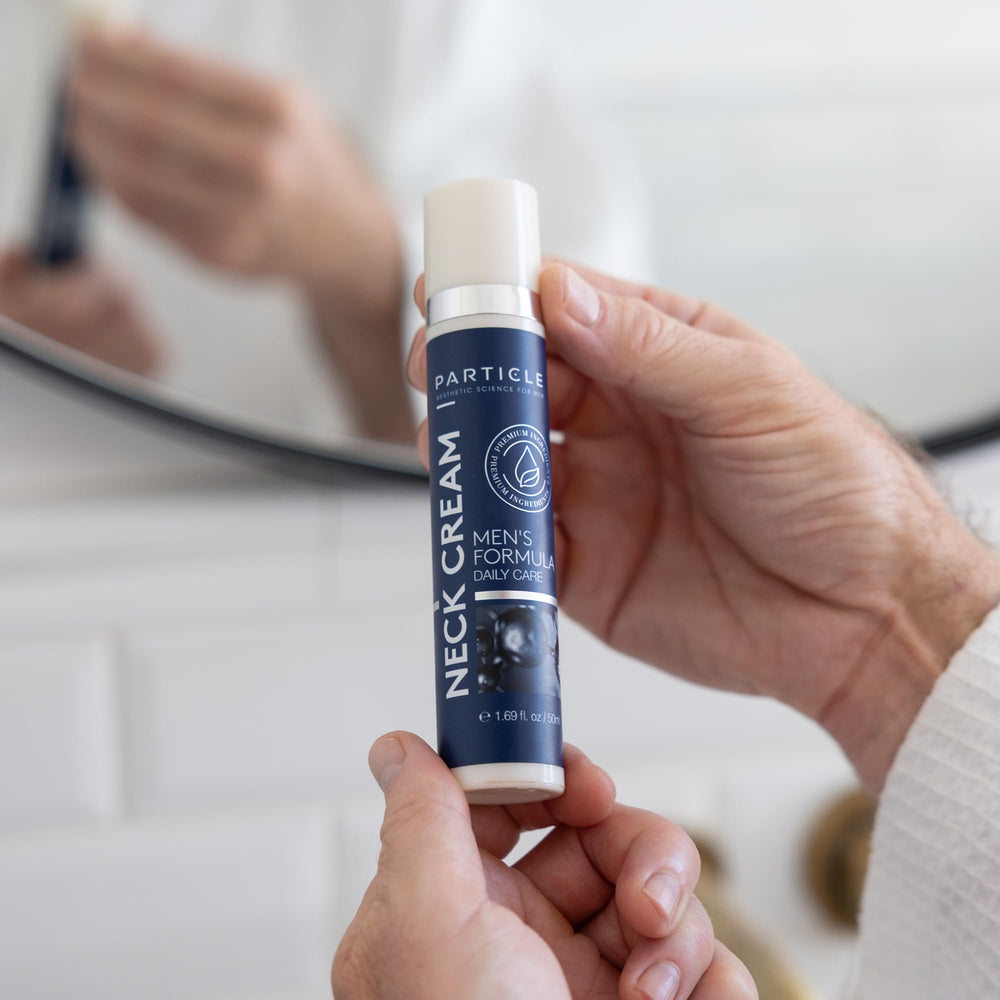 Particle neck cream applied to neck illustrating easy absorption and layering