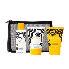 PATTERN travel kit front view in mesh bag showing compact convenience