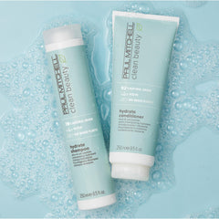 Paul Mitchell conditioner creamy texture on palm showing easy spread and hydration