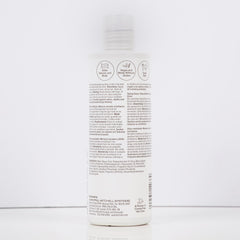 Paul Mitchell glaze on bathroom shelf in lifestyle setting showcasing salon-quality at home