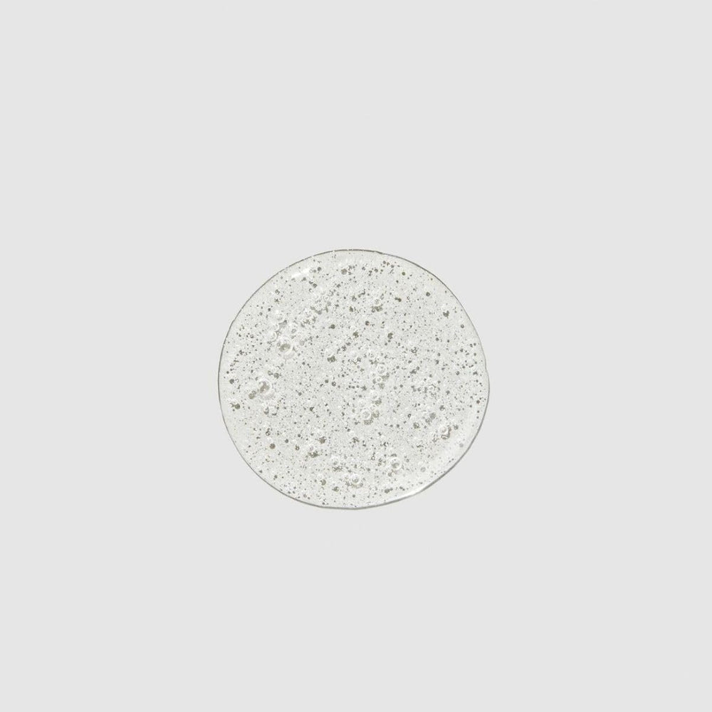 Paul Mitchell shampoo texture on hand demonstrating rich, gentle lather