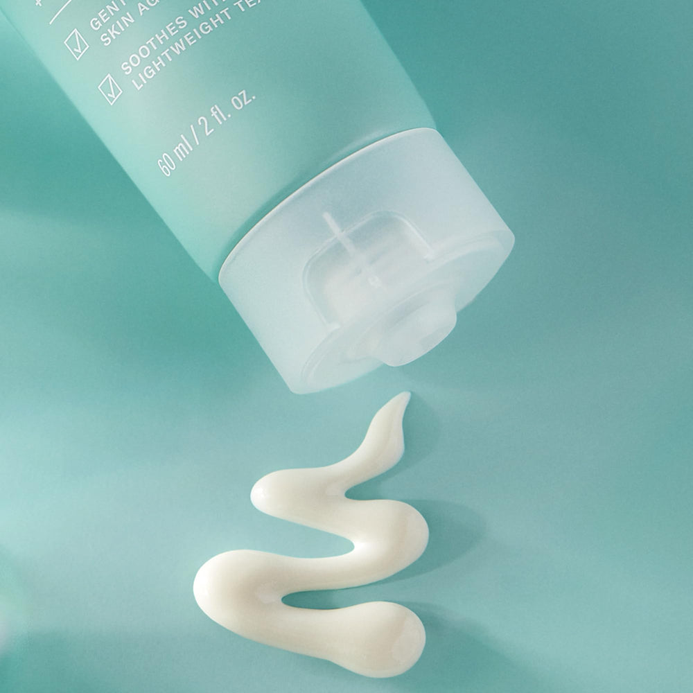 Paula's Choice applying sunscreen to cheek demonstrating even coverage