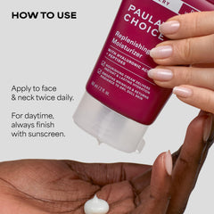 Paula's Choice moisturizer in hand to show 2 oz scale and travel-friendly size