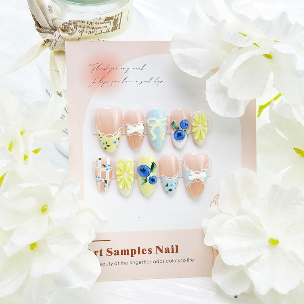 PBPCGBW nails held in hand to show short almond scale and practical everyday length