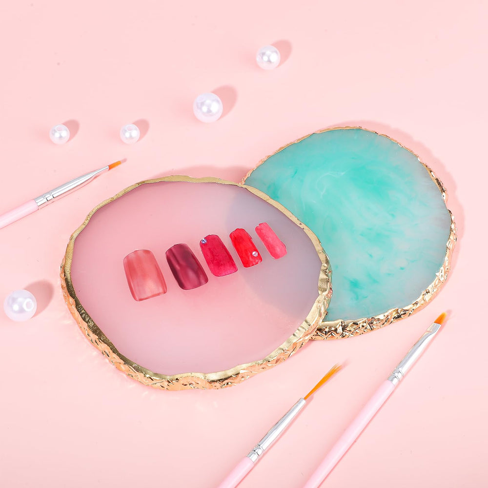 Pengxiaomei palette next to nail tools showing scale and travel-ready size
