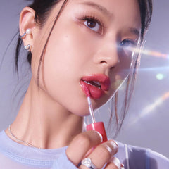 Peripera tube next to hand showing size and travel-friendly convenience benefit
