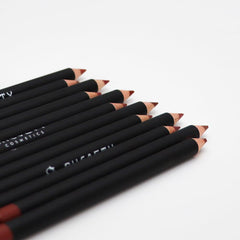 Petansy pencil held in hand for scale showing compact size benefit: travel-friendly