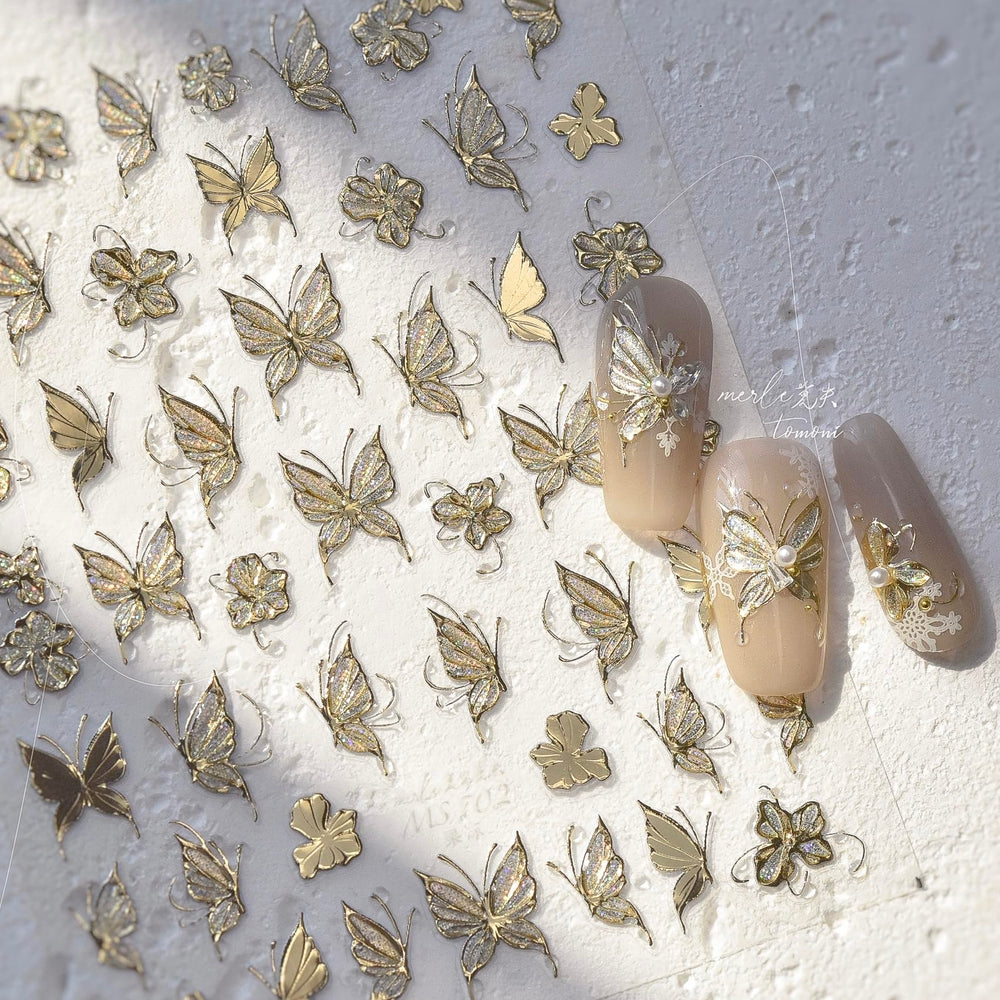 Phuryllic gold butterfly on finished manicure, adds elegant dimensional accent