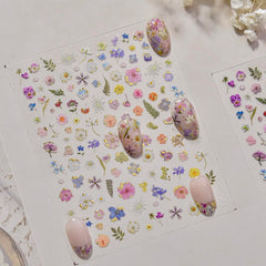 At-home manicure scene using Phuryllic stickers for quick salon-style nails