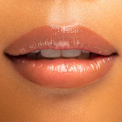 Physicians Formula texture swatch of serum-like gloss demonstrating lightweight shine