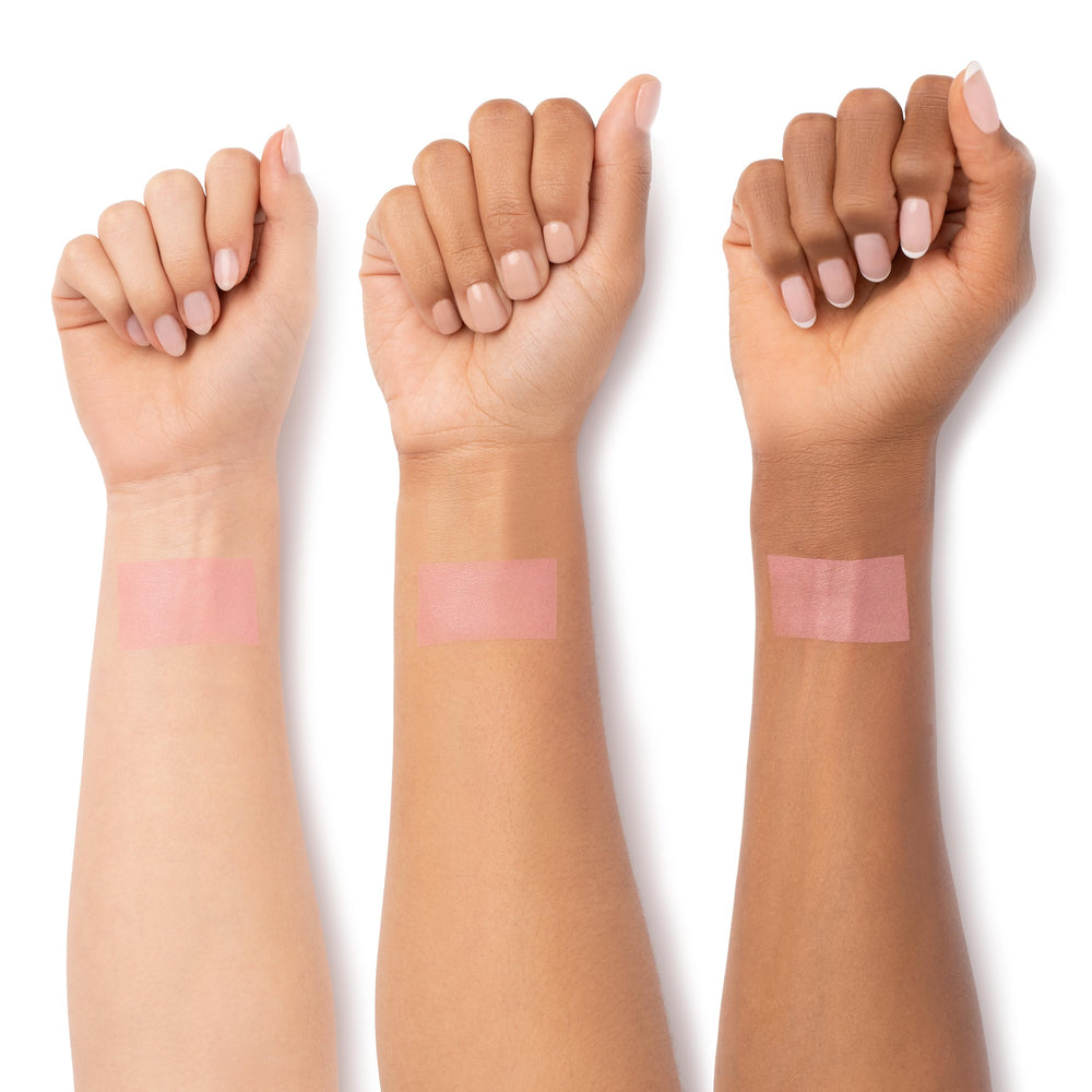 Physicians Formula finger applying blush demonstrating easy spread and natural-looking glow