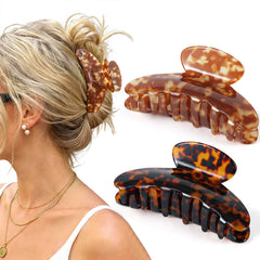 Phyzylvia front packaging showing two tortoise-leopard claw clips and style benefit