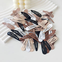 PIDOUDOU five-color array flatlay demonstrating coordinated outfit matching