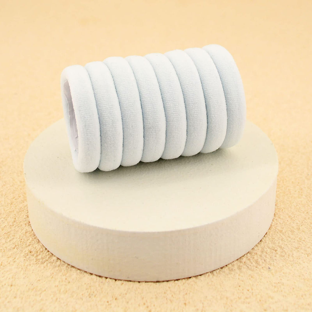 PIDOUDOU hair tie holding thick ponytail securely during activity
