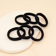 PIDOUDOU hair tie securing a thick ponytail for strong hold benefit