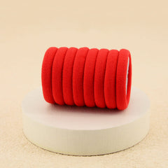PIDOUDOU worn in high ponytail showing secure hold during activity