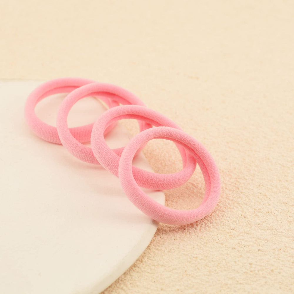 PIDOUDOU on a bathroom counter with brush showing everyday styling convenience benefit