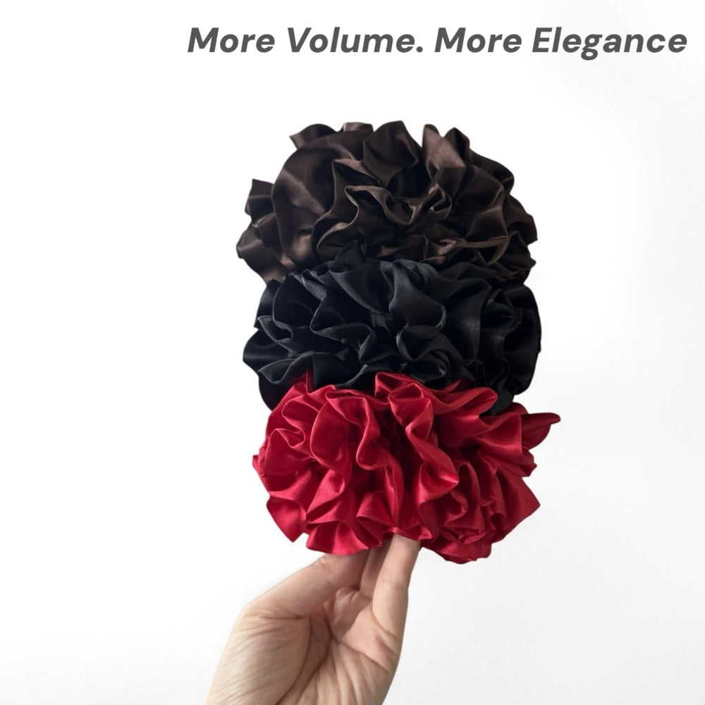 PIDOUDOU scrunchie on wrist next to outfit shows accessory versatility benefit