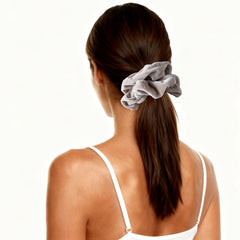 PIDOUDOU low bun with scrunchie illustrating crease-free styling benefit