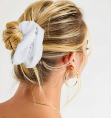 PIDOUDOU scrunchie in use holding a high ponytail securely with comfortable all-day wear benefit