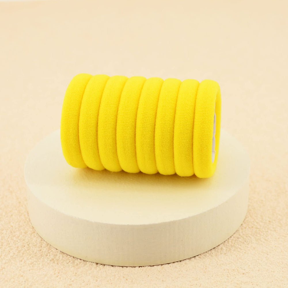 PIDOUDOU hair tie stretched to show elasticity and durability