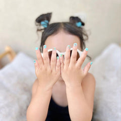 Packaging and ingredient list for Piggy Paint highlighting non-toxic claims