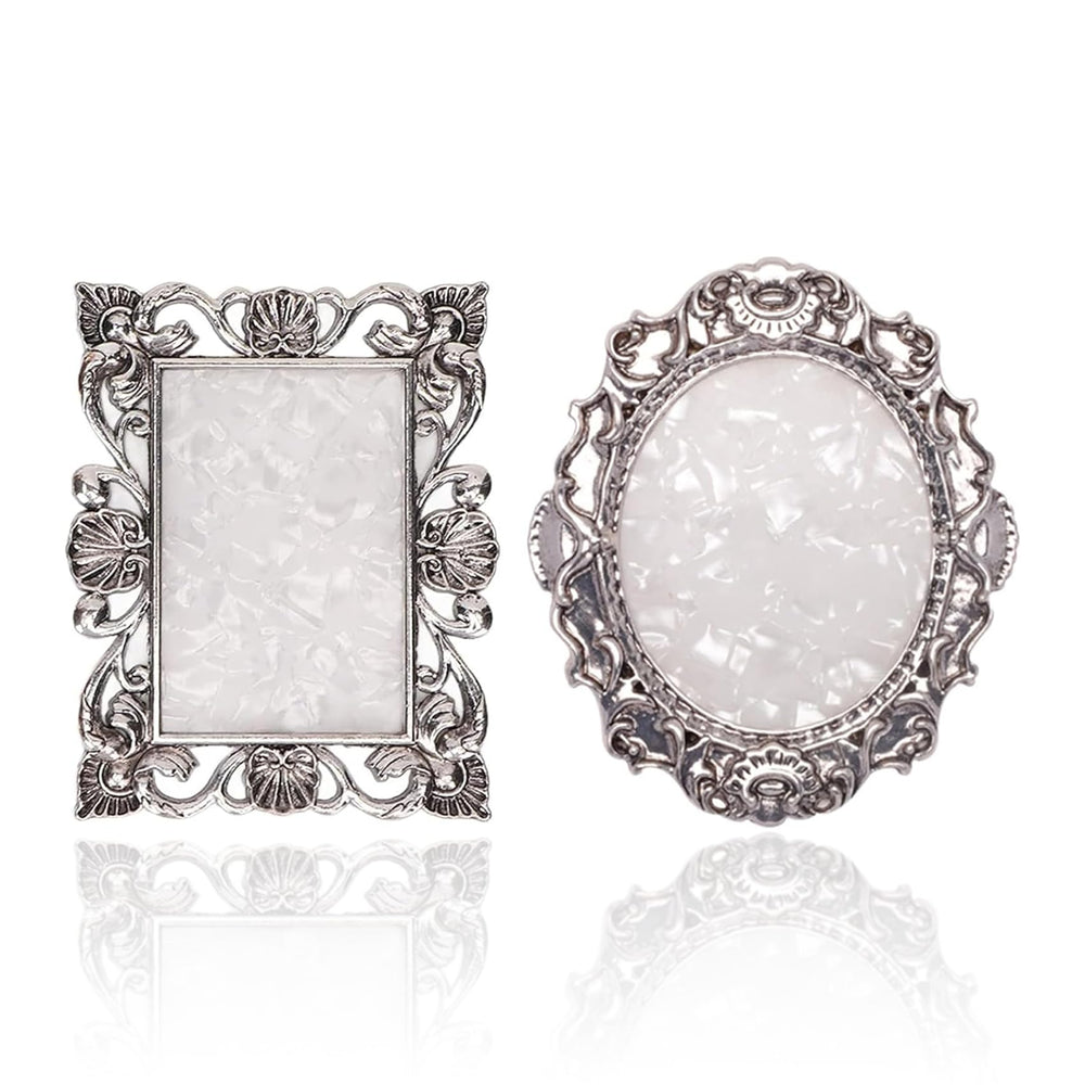 Pinkoriart front view of two silver-edged palettes showing compact shape and polish-ready surface
