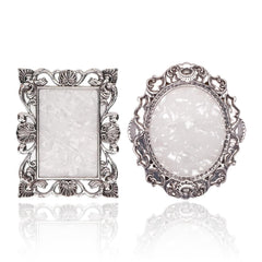 Pinkoriart front view of two silver-edged palettes showing compact shape and polish-ready surface