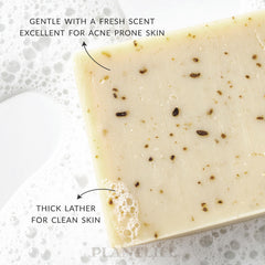 Plantlife 4oz bar held in hand demonstrating compact travel-ready size and usability