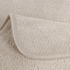 POLYTE close-up of dual-pile terry texture highlighting gentle exfoliation