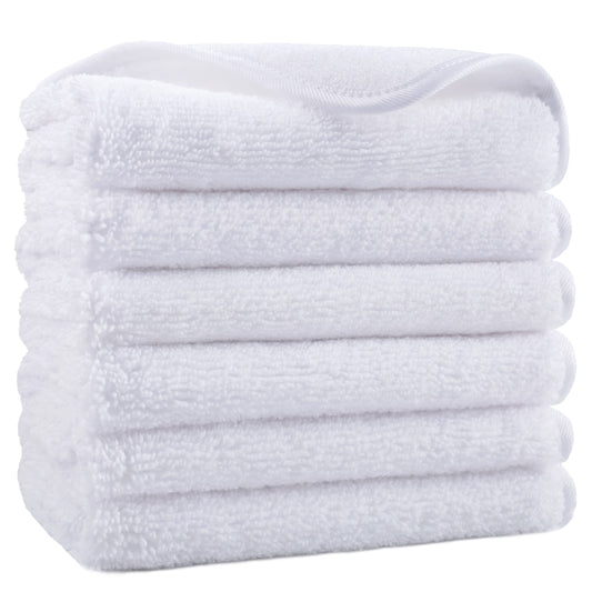 POLYTE front view of six white washcloths showing neat folded stack and clean look, practical storage