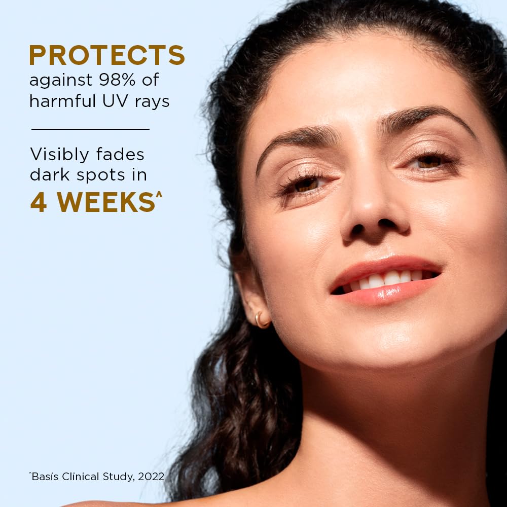 POND'S sunscreen being applied on hand demonstrating easy spread
