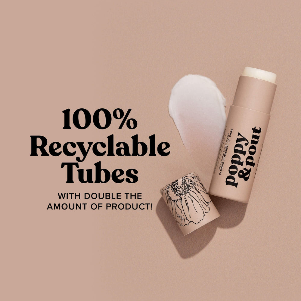 Poppy & Pout lip balm on beach towel showing tropical scent benefit