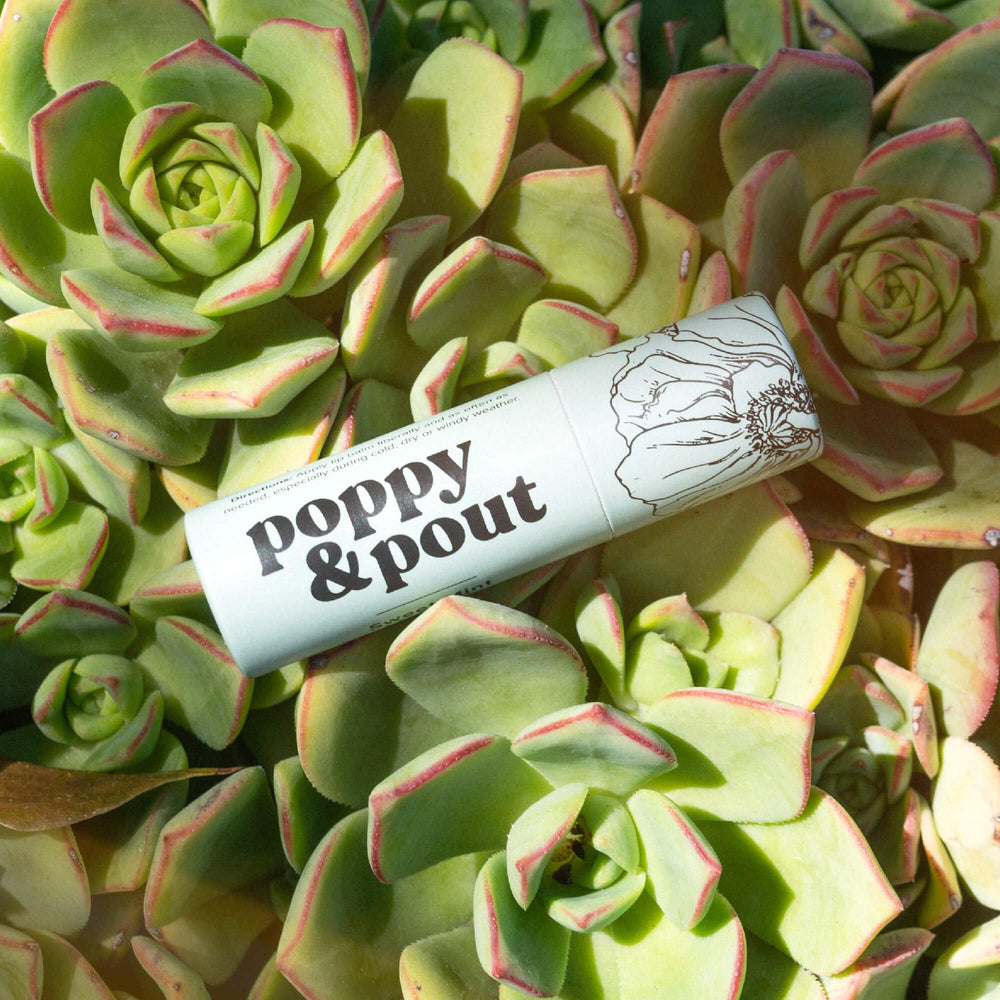 Poppy & Pout lifestyle outdoors image showing long-lasting protection